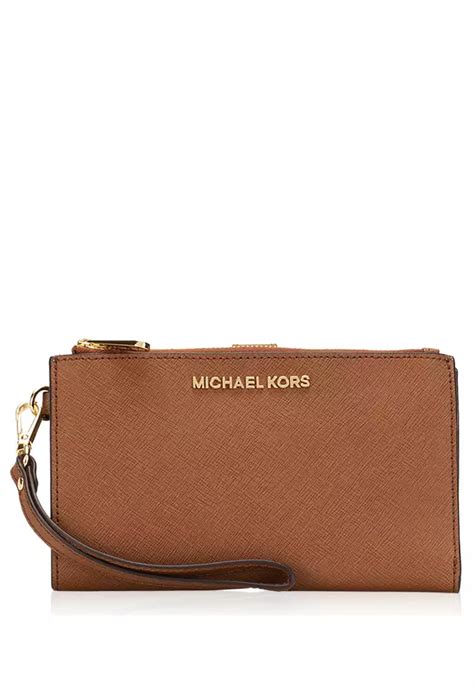 michael kors jet set zipper travel wristlet|Michael Kors wristlet.